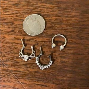 septum rings. 2 16G clickers, 1 14G horse shoe